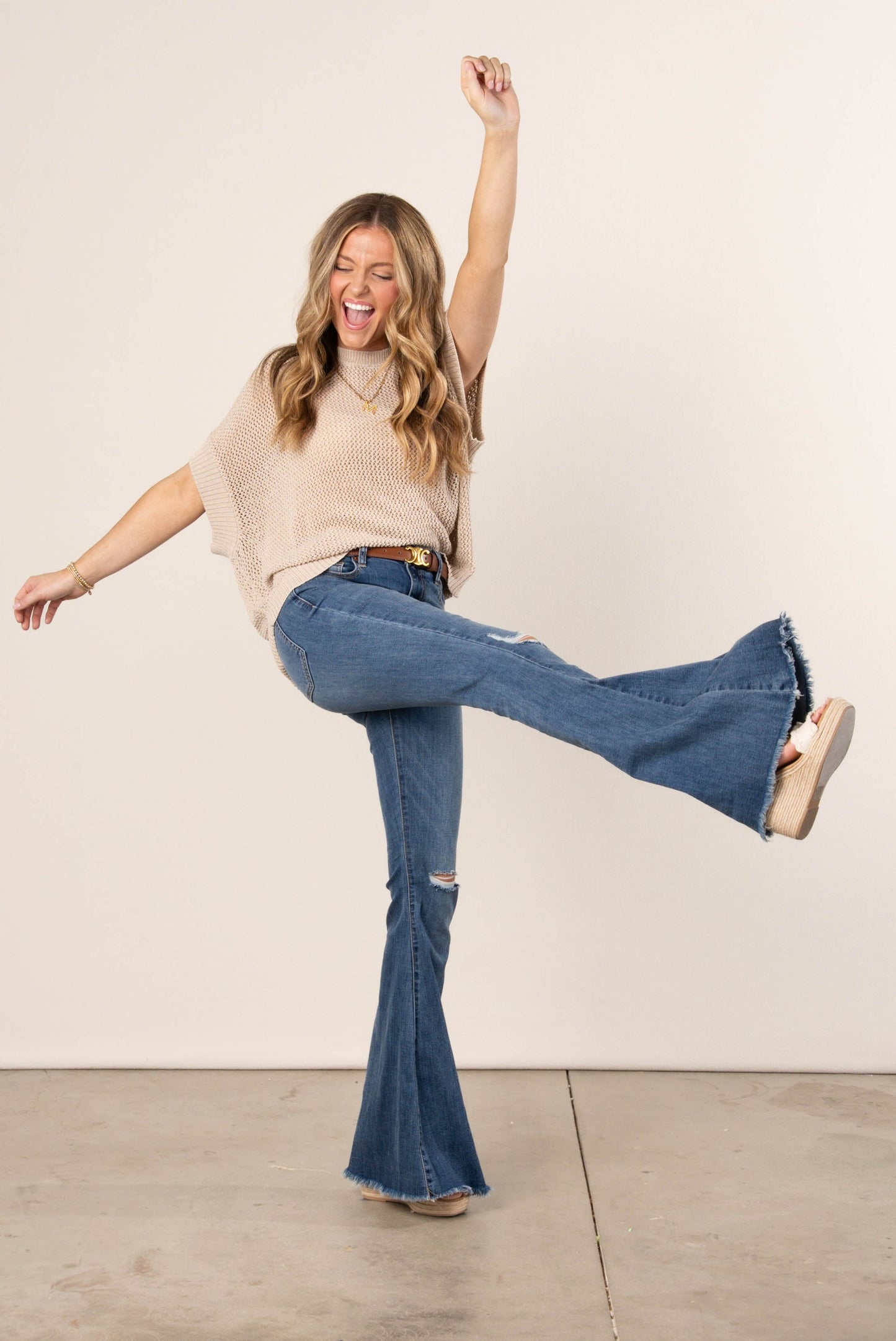 Sneak Peek High Rise Flare Jeans