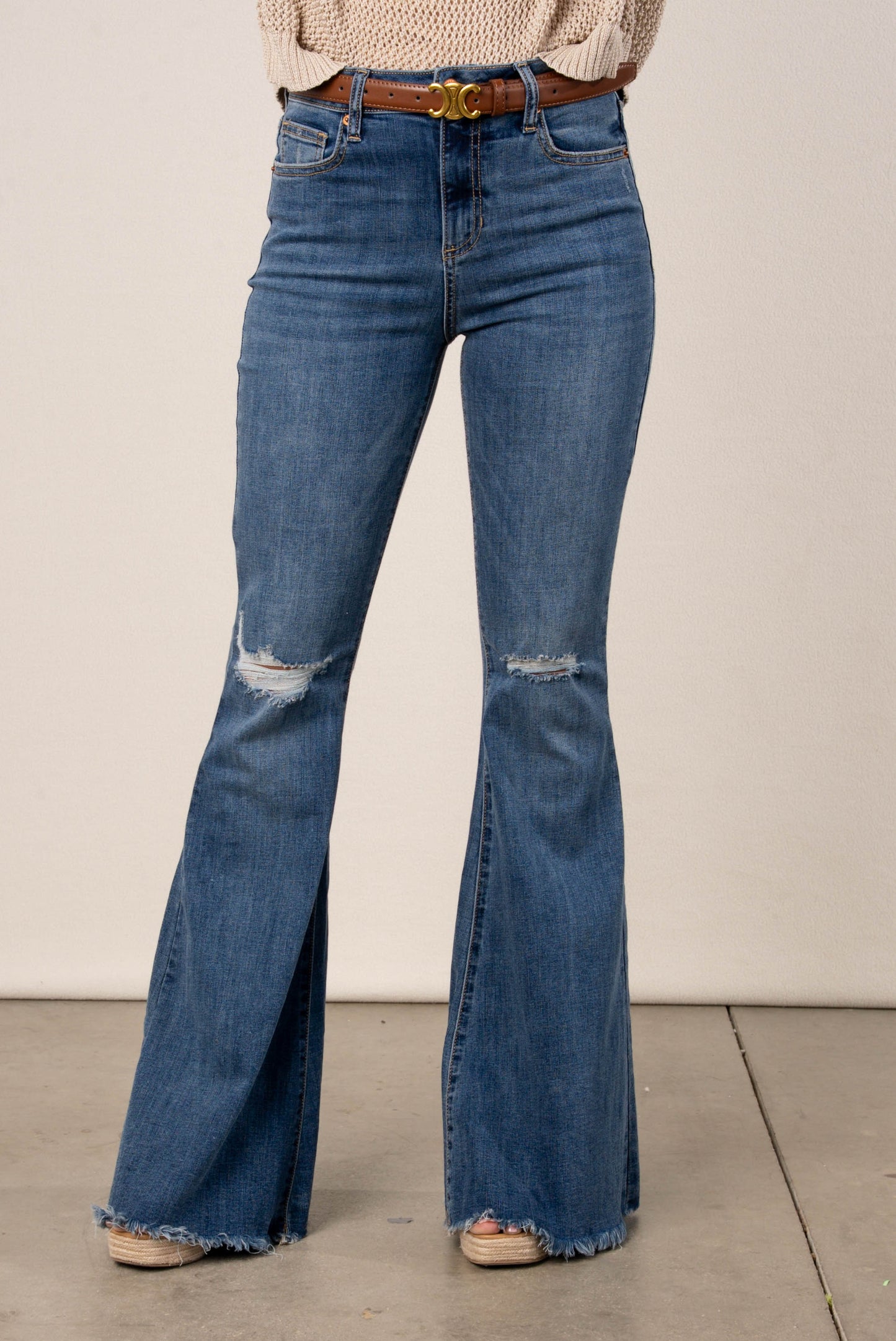 Sneak Peek High Rise Flare Jeans