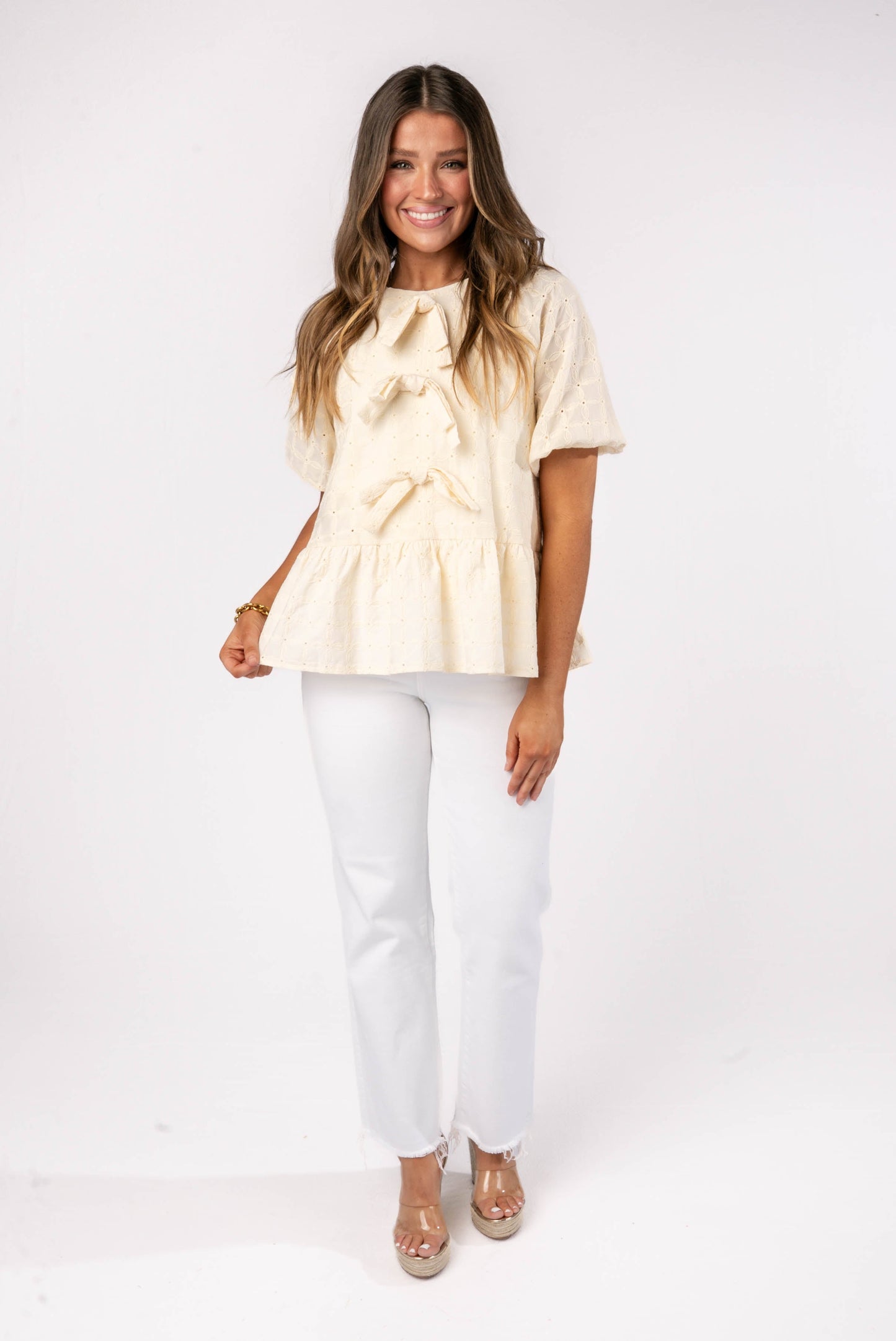 Eyelet Front Bow Peplum Top