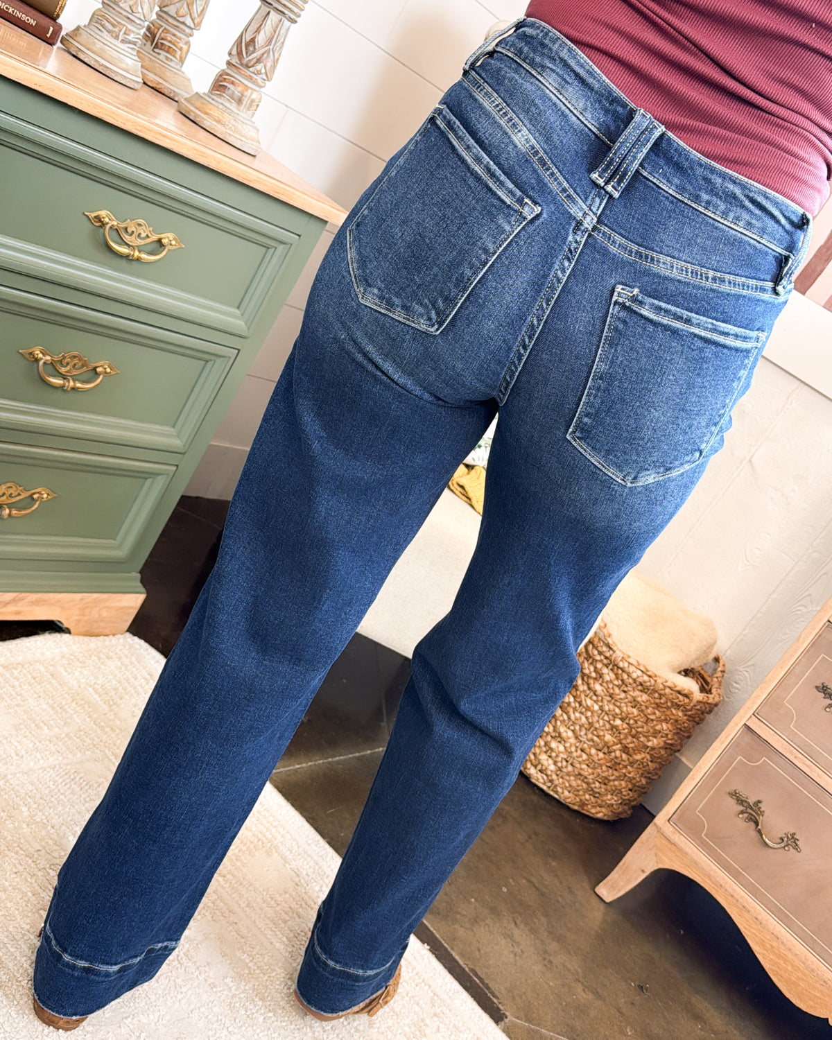 Back view of the dark wash high rise wide leg jeans showing the back pockets