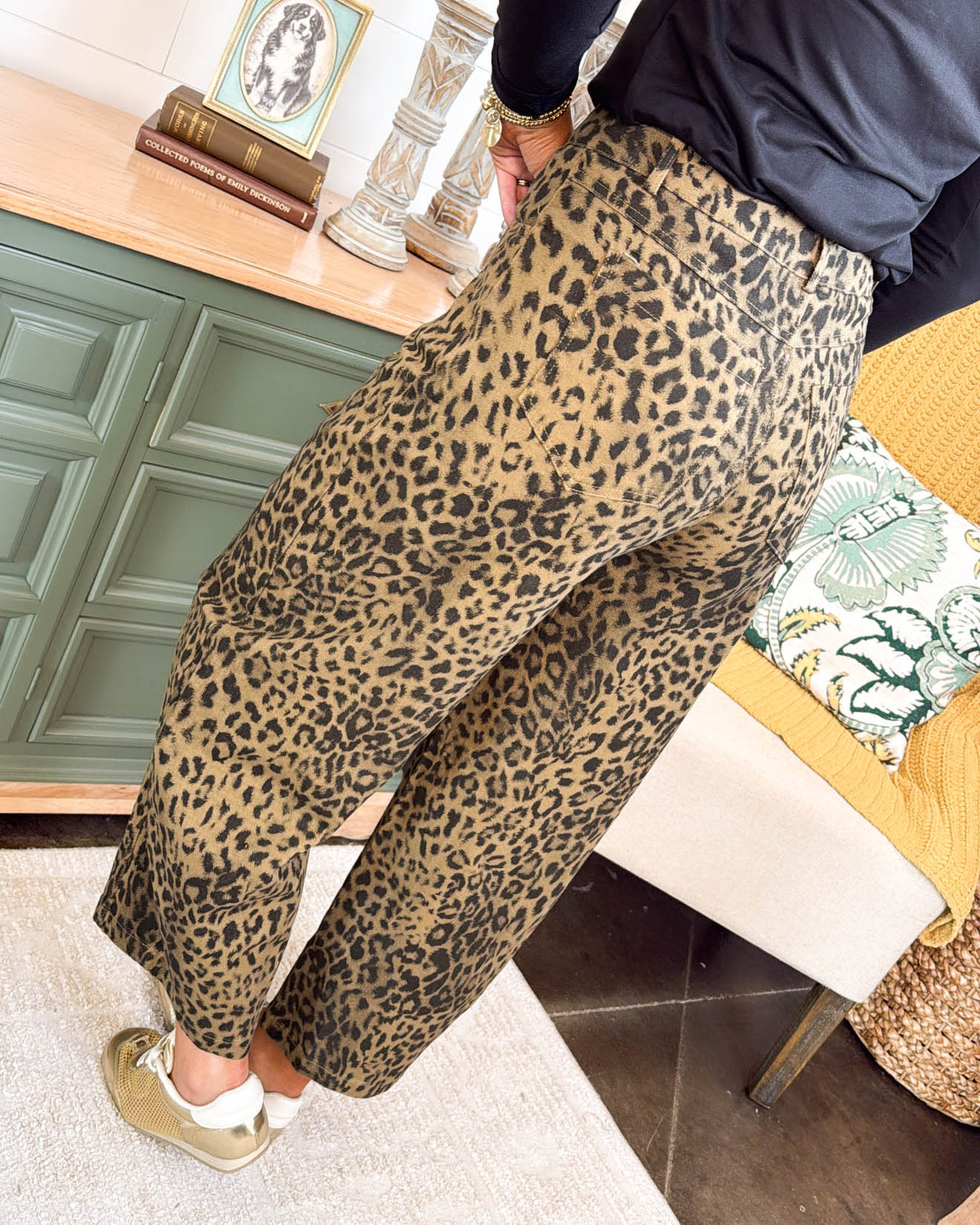 Side view of the camel leopard print high rise barrel pants