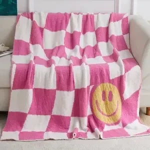 plush checkered smiley face blanket
