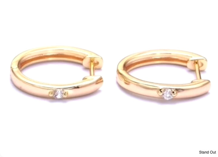 Stand Out CZ Huggie Earrings